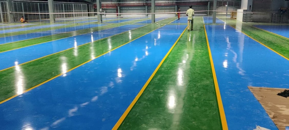 Blue and green epoxy flooring in Hosur