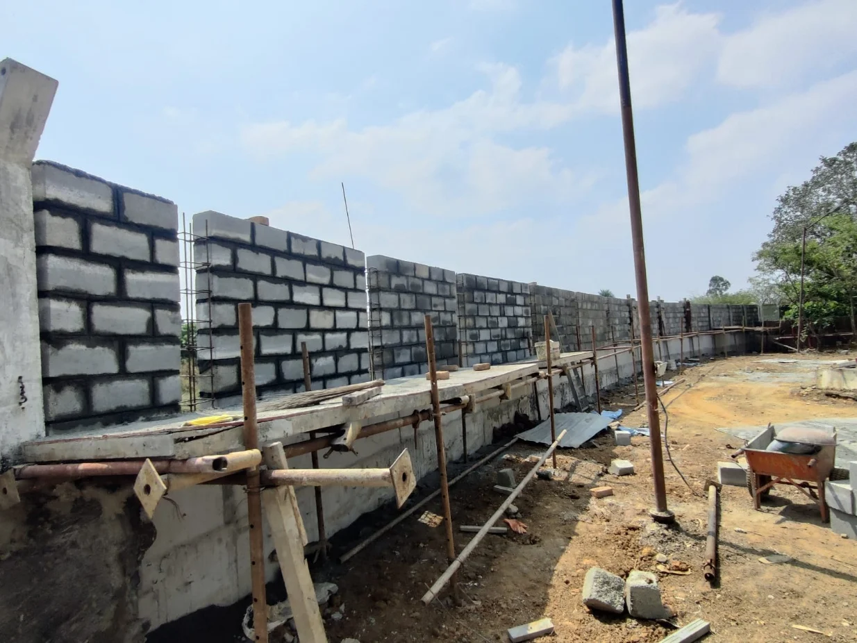 Compound wall works in Arani